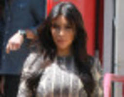 Kim Kardashian Dons Pleated Maxi Dress For Lunch Outing